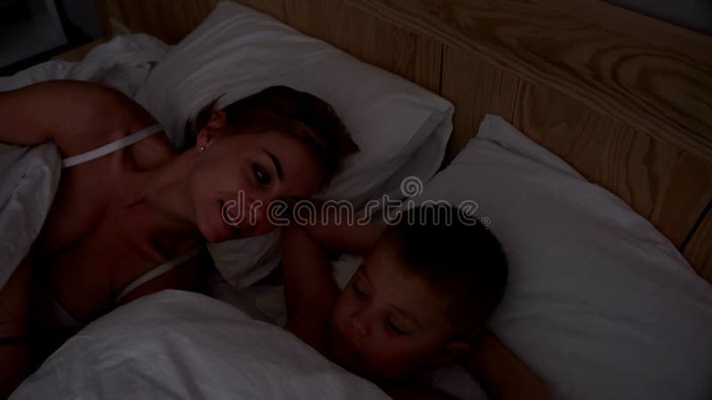 stepmom and son in bed