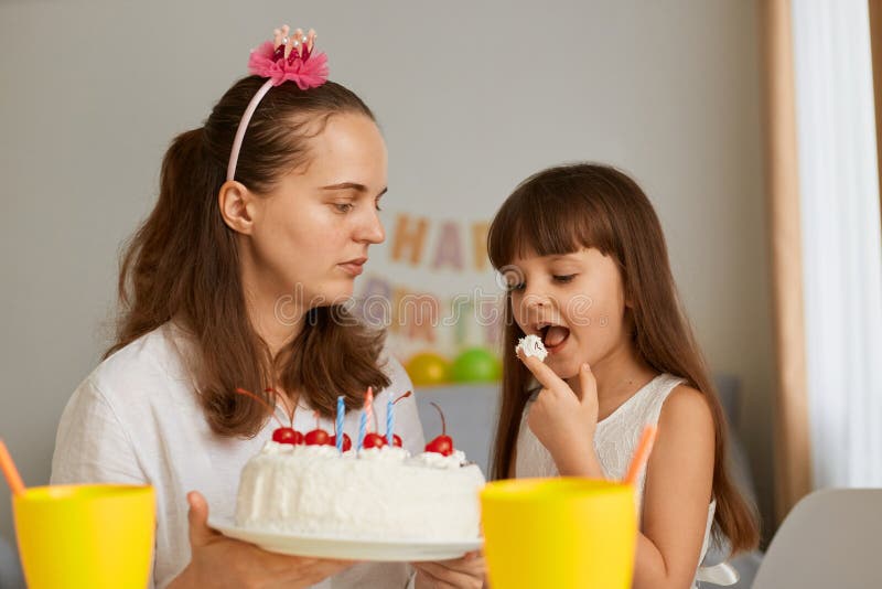 mother daughter licking