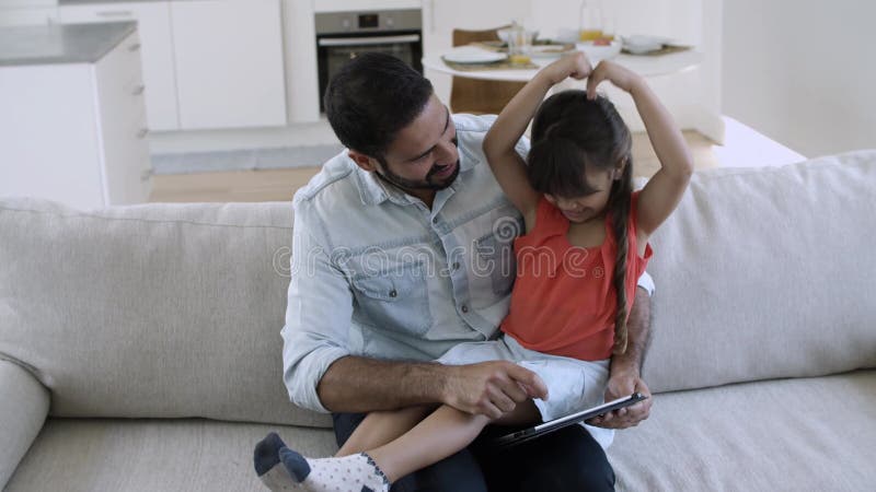 avishay amon add daughter sitting on daddys lap photo