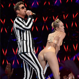 anne paulin share miley cyrus performing nude photos