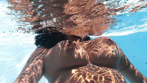 aj mendoza recommends huge tits underwater pic