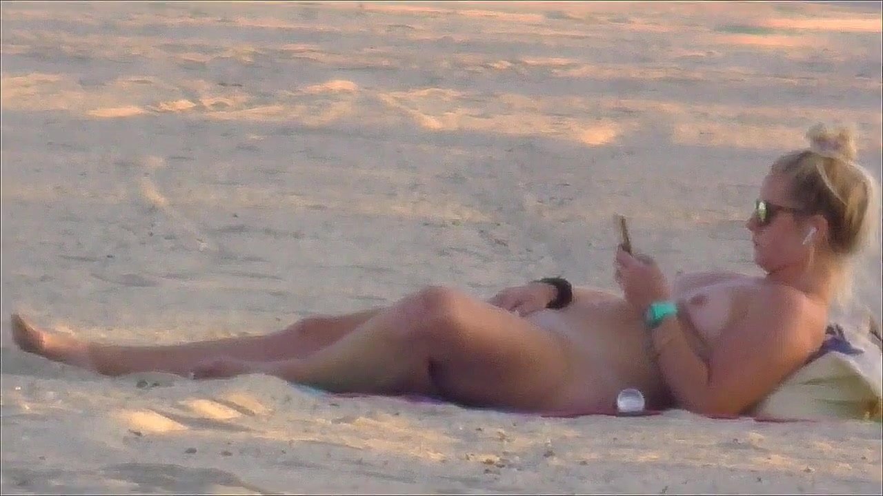 david febles recommends lady masterbating on beach pic