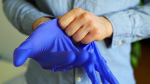 arnold thompson add latex glove porn photo