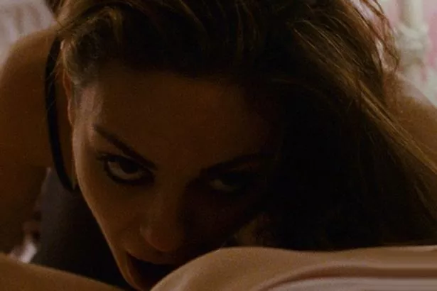 Mila Kunis Sexiest Scenes at truckers