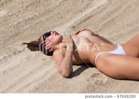 ada caines recommends my wife naked on the beach pic