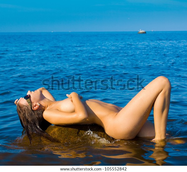 carlos bacilio recommends nude beach posing pic