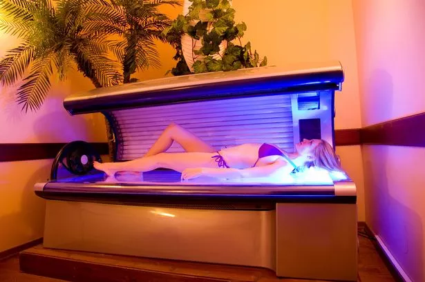 spycam tanning bed