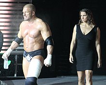 akim armstrong add triple h boobs photo